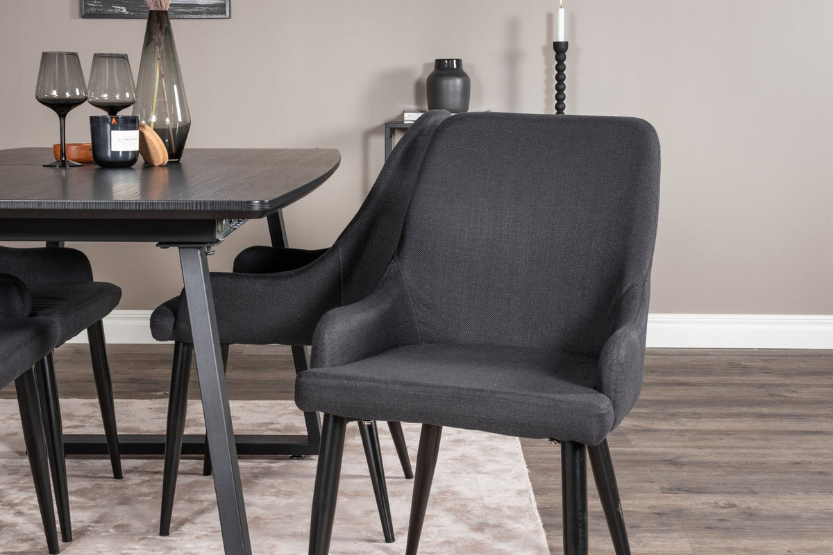 Schwarzes Esszimmerset aus MDF und Stahl: rechteckiger Esstisch 160x85 cm und zwei gepolsterte Stühle mit pulverbeschichtetem Stahlgestell.