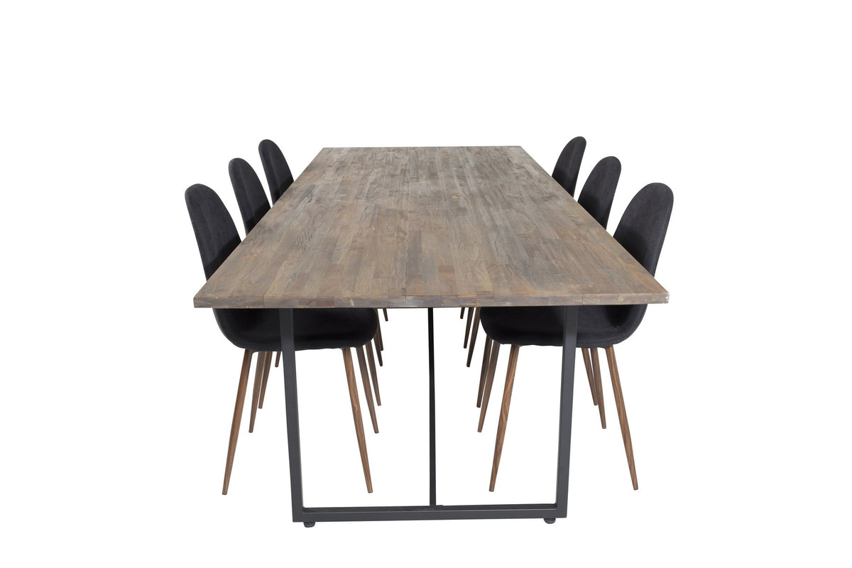 Esstisch mit Teak-Tischplatte in Natur und Stahlgestell, dazu Stühle mit schwarzem Stahlrahmen und grauem Polyester-Samt-Bezug.