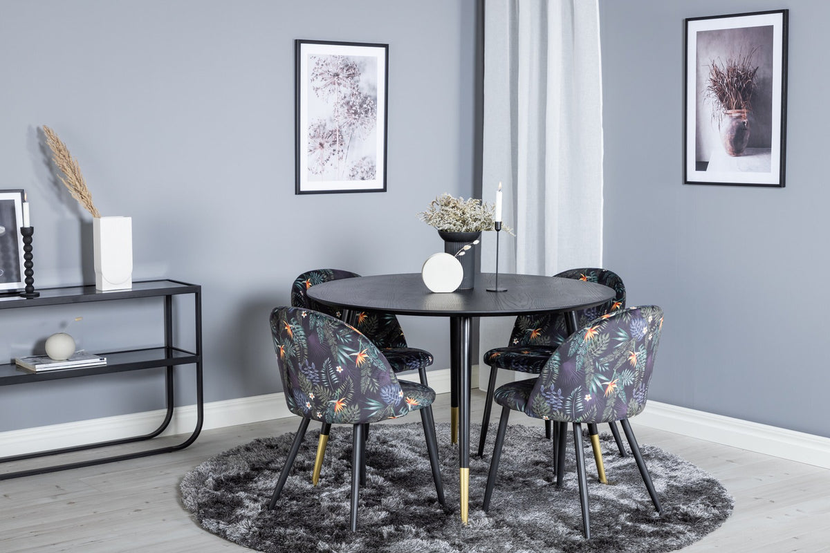 Rundes Dipp Esszimmerset: Esstisch ⌀115 cm mit schwarzem Furnier und schwarzen Beinen, dazu vier Velvet-Stühle mit schwarz-grauem Mikrofaserbezug.