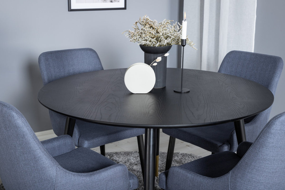 Rundes Esszimmerset von Venture Home: schwarzer MDF-Tisch mit Stahlbeinen und zwei blaue Stühle mit schwarzem Stahlgestell.