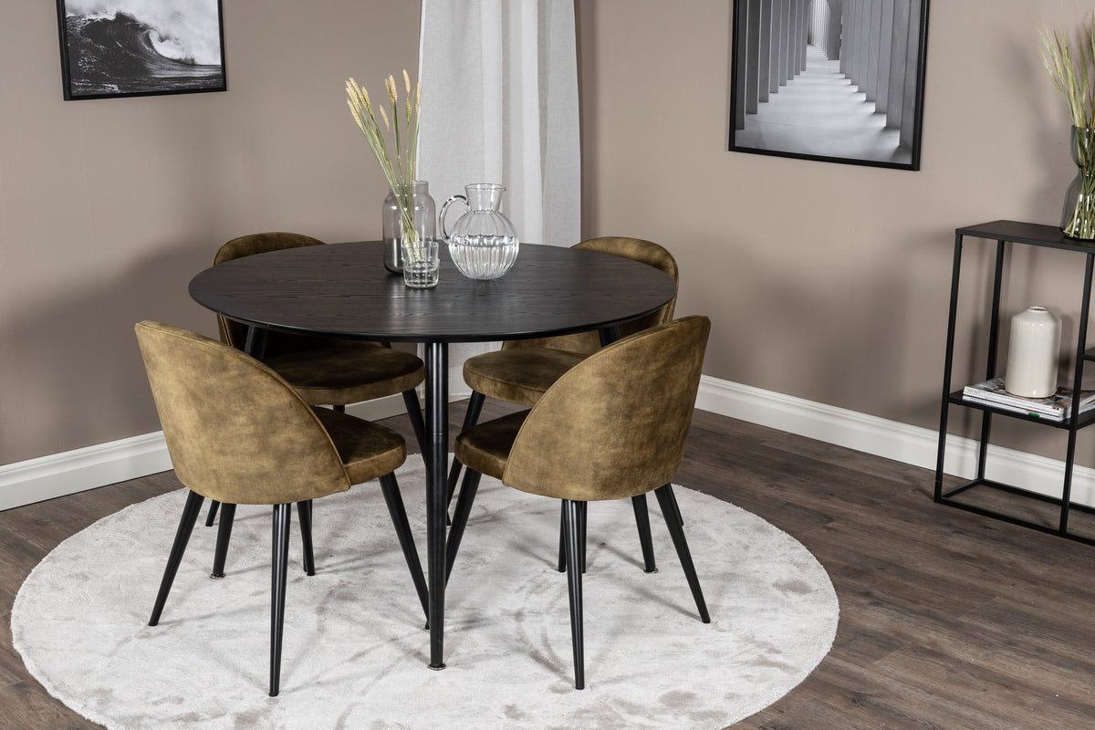 Rundes Dipp Esszimmerset: Esstisch ⌀115 cm mit schwarzem Furnier und schwarzen Beinen, dazu vier Velvet-Stühle mit schwarz-grauem Mikrofaserbezug.