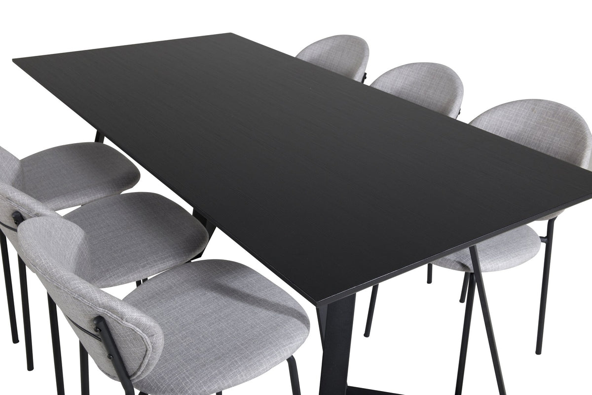 Esszimmerset Marina mit rechteckigem Tisch aus MDF und Papierlaminat sowie Stühlen mit Stahlgestell und Polyesterbezug in Grau.