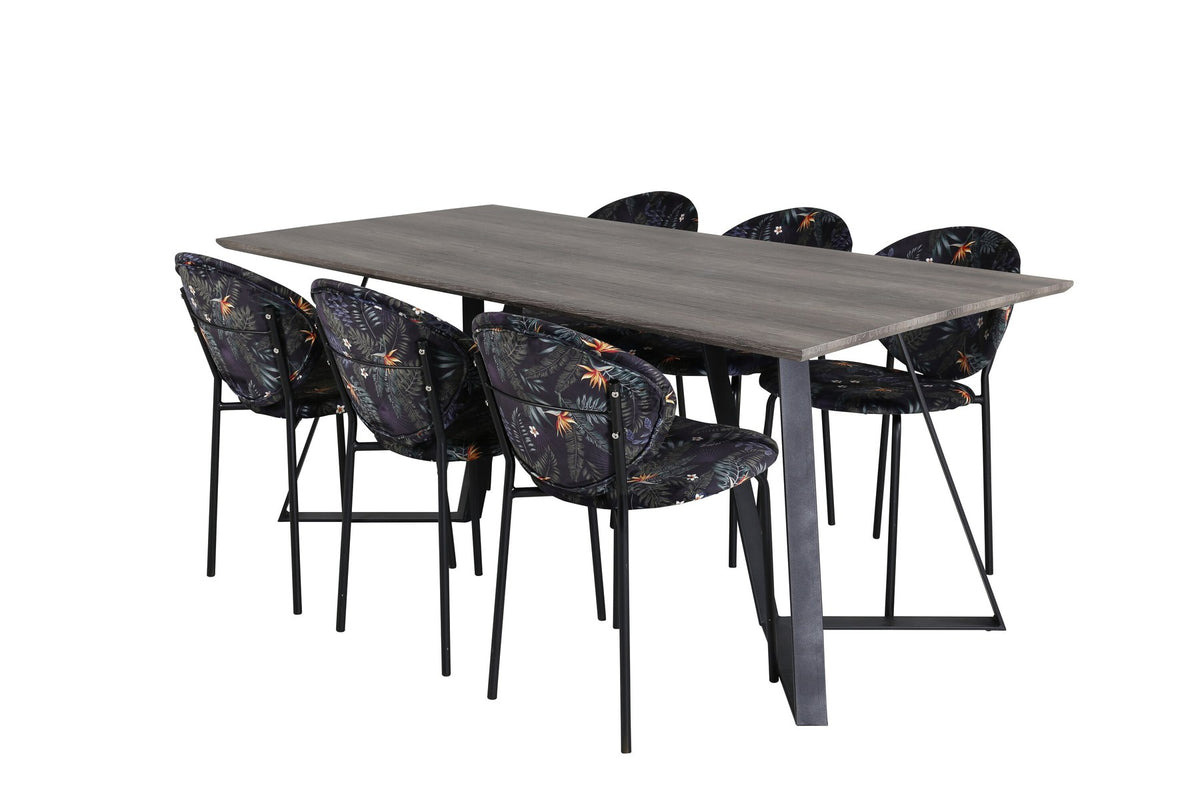 Esszimmerset Marina mit rechteckigem Tisch aus MDF und Papierlaminat sowie Stühlen mit Stahlgestell und Polyesterbezug in Grau.