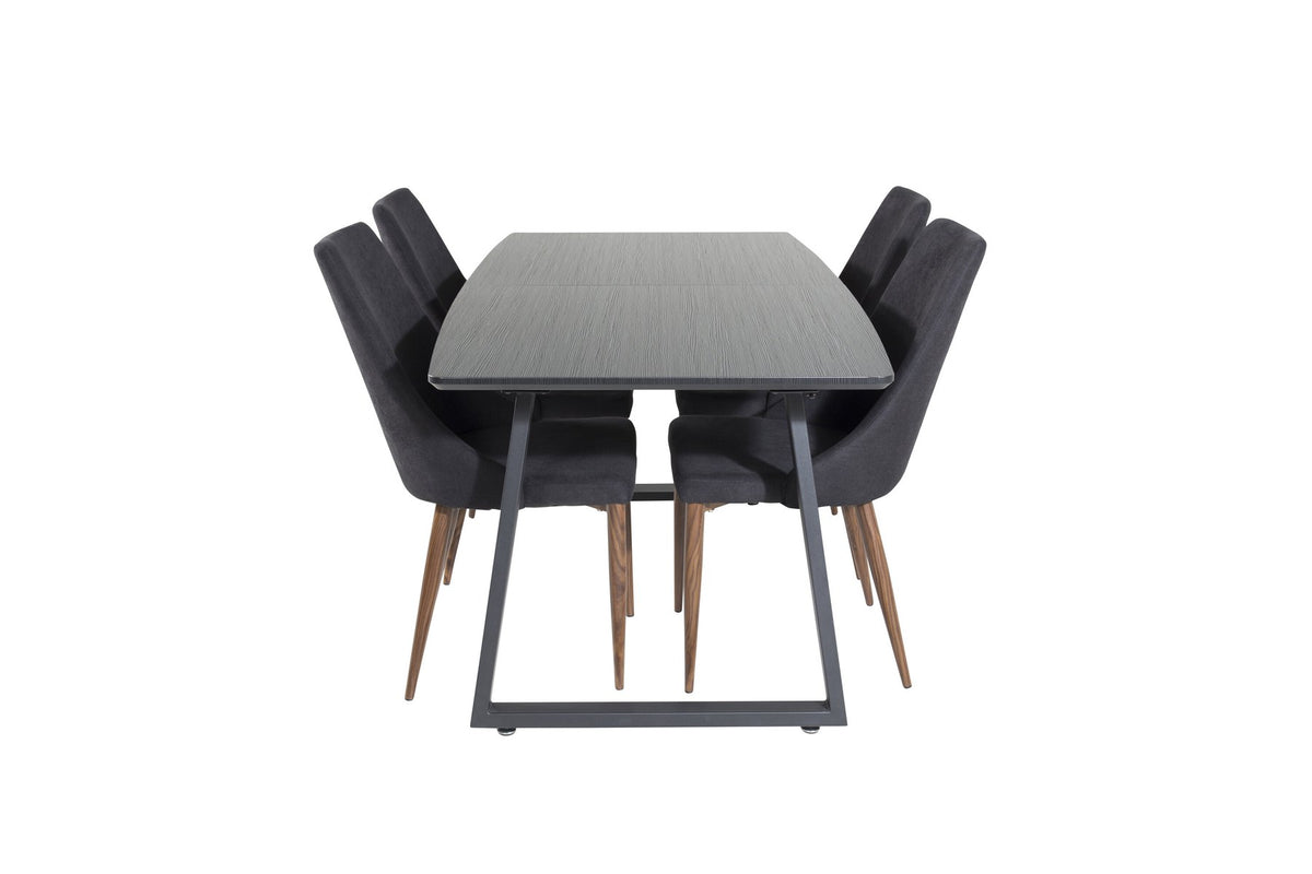 Zwei schwarze Esszimmerstühle mit Stahlbeinen und ausziehbarer schwarzer Esstisch mit MDF-Platte, Serie Leone & Inca von Venture Home.
