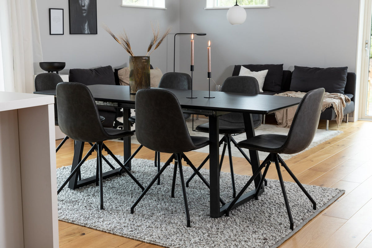 Schwarzes Inca Esszimmerset von Venture Home: ausziehbarer Tisch aus MDF, Sperrholz und Stahl mit sechs passenden Stühlen der Serie Polar