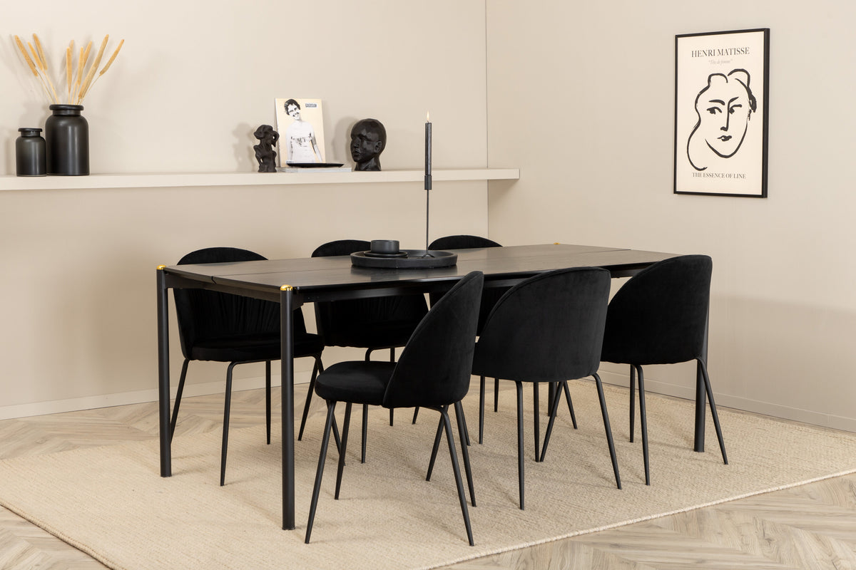 Esszimmerset Pelle mit schwarzem MDF-Tisch und sechs gepolsterten Wrinkles-Stühlen aus schwarzem Samt und Metallbeinen aus Stahl.