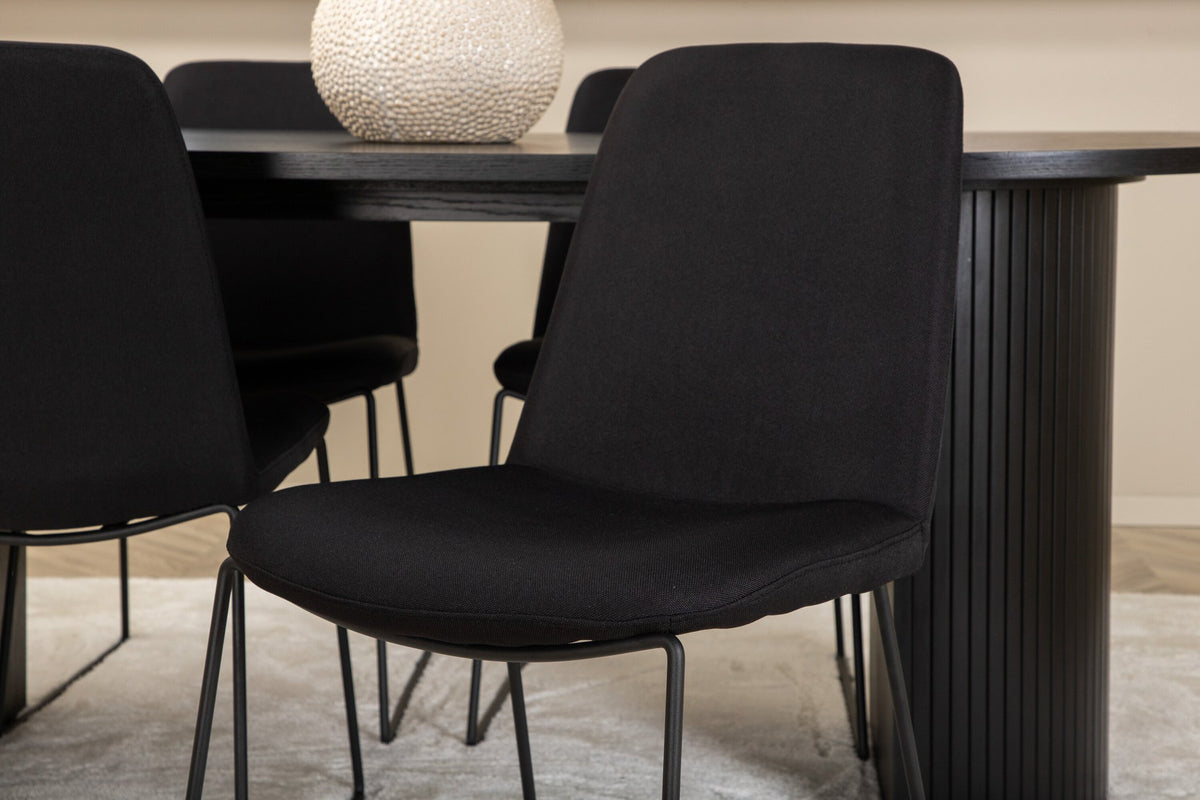 Schwarzes Bartischset Bianca mit vier Muce-Stühlen, Tischplatte aus MDF mit Furnier, Stuhlbeine aus schwarzem Metall, Sitz aus Polyester.