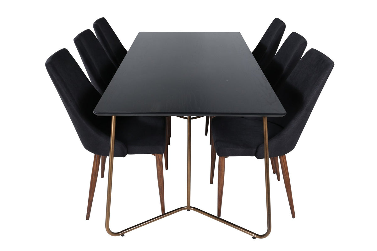 Rechteckiger Esstisch aus schwarzem MDF mit Furnier und Stahlbeinen, dazu zwei Esszimmerstühle mit schwarzer Sitzfläche und Metallgestell.