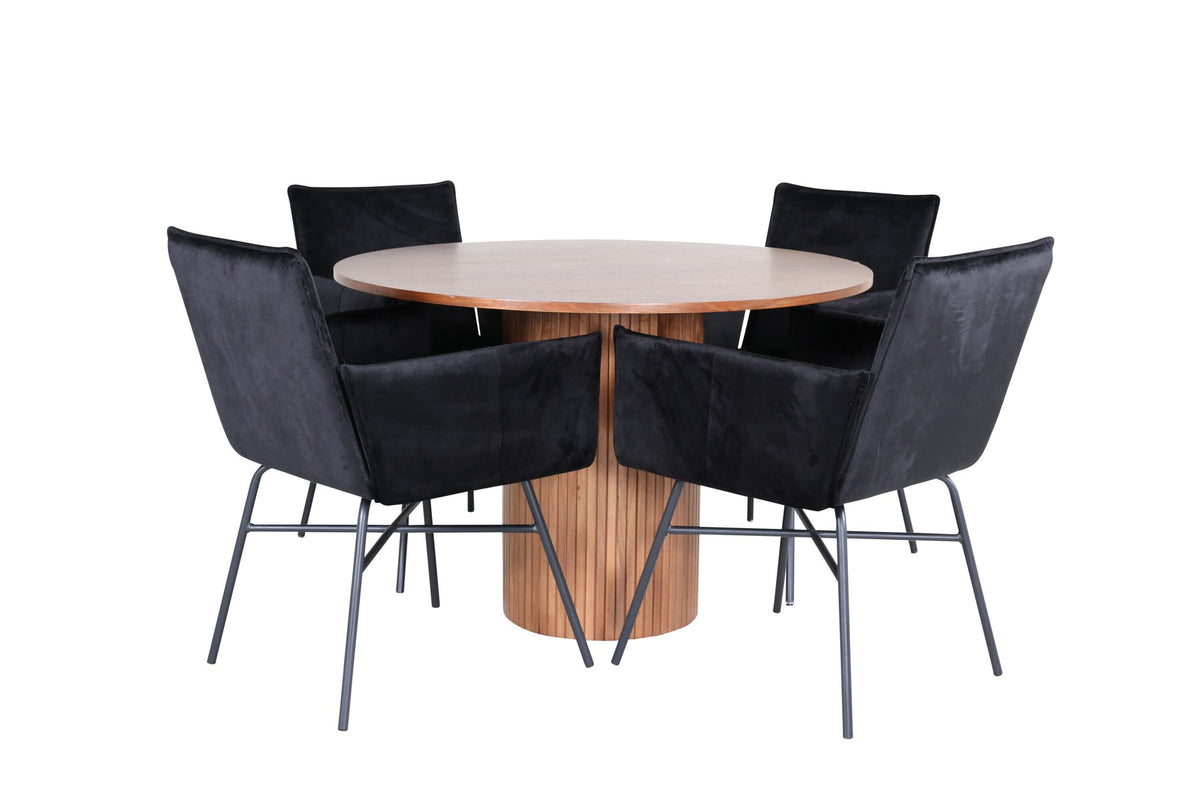 Rundes Esszimmerset mit Nussbaum-Tischplatte Ø110cm aus MDF und vier schwarzen Stühlen mit Samtsitz und Beinen aus Eisen.