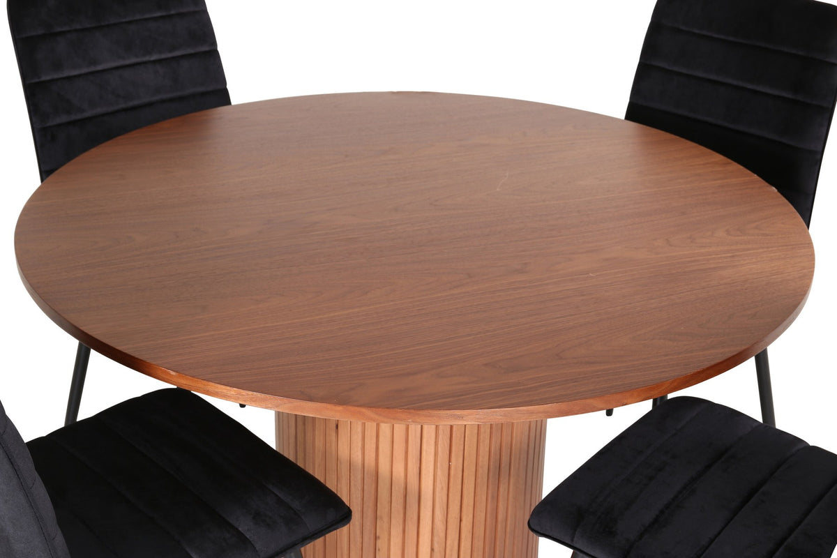 Rundes Esszimmerset Bianca mit schwarzer MDF-Tischplatte, Rippengestell und vier Windu-Stühlen mit schwarzem Samtbezug und Stahlbeinen.
