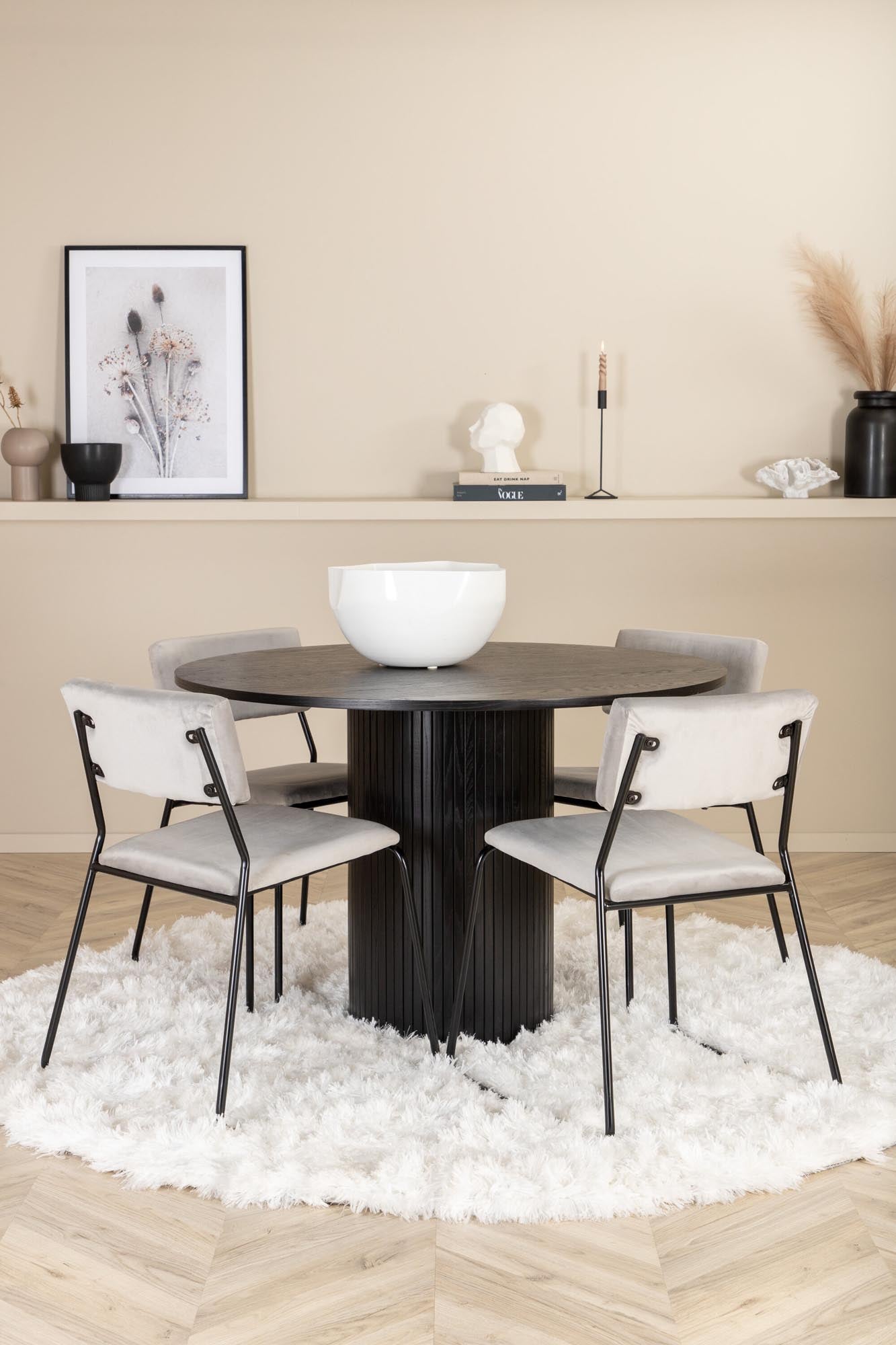 Modernes Esszimmerset: Runder Tisch mit pflegeleichter MDF-Oberfläche, 4 bequeme Samtstühle in elegantem Grau. Ideal für gesellige Abende.