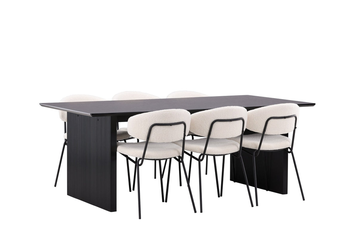 Esszimmerset aus rechteckigem MDF-Tisch in Rauchschwarz mit sechs Limhamn-Stühlen, beiger Samtbezug, muschelförmige Rückenlehne, schwarze Metallbeine.