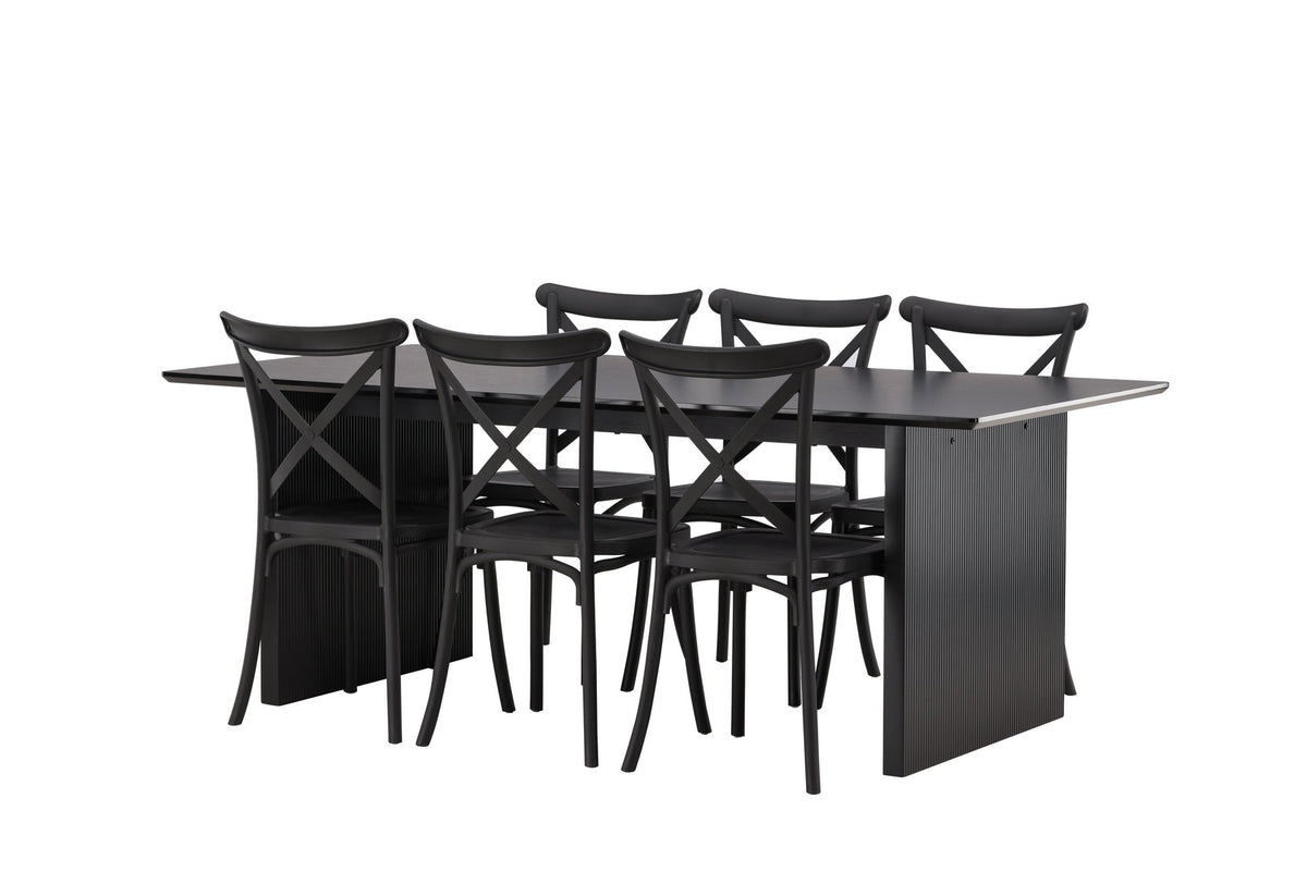 Esszimmerset aus rechteckigem MDF-Tisch in Rauchschwarz mit sechs Limhamn-Stühlen, beiger Samtbezug, muschelförmige Rückenlehne, schwarze Metallbeine.