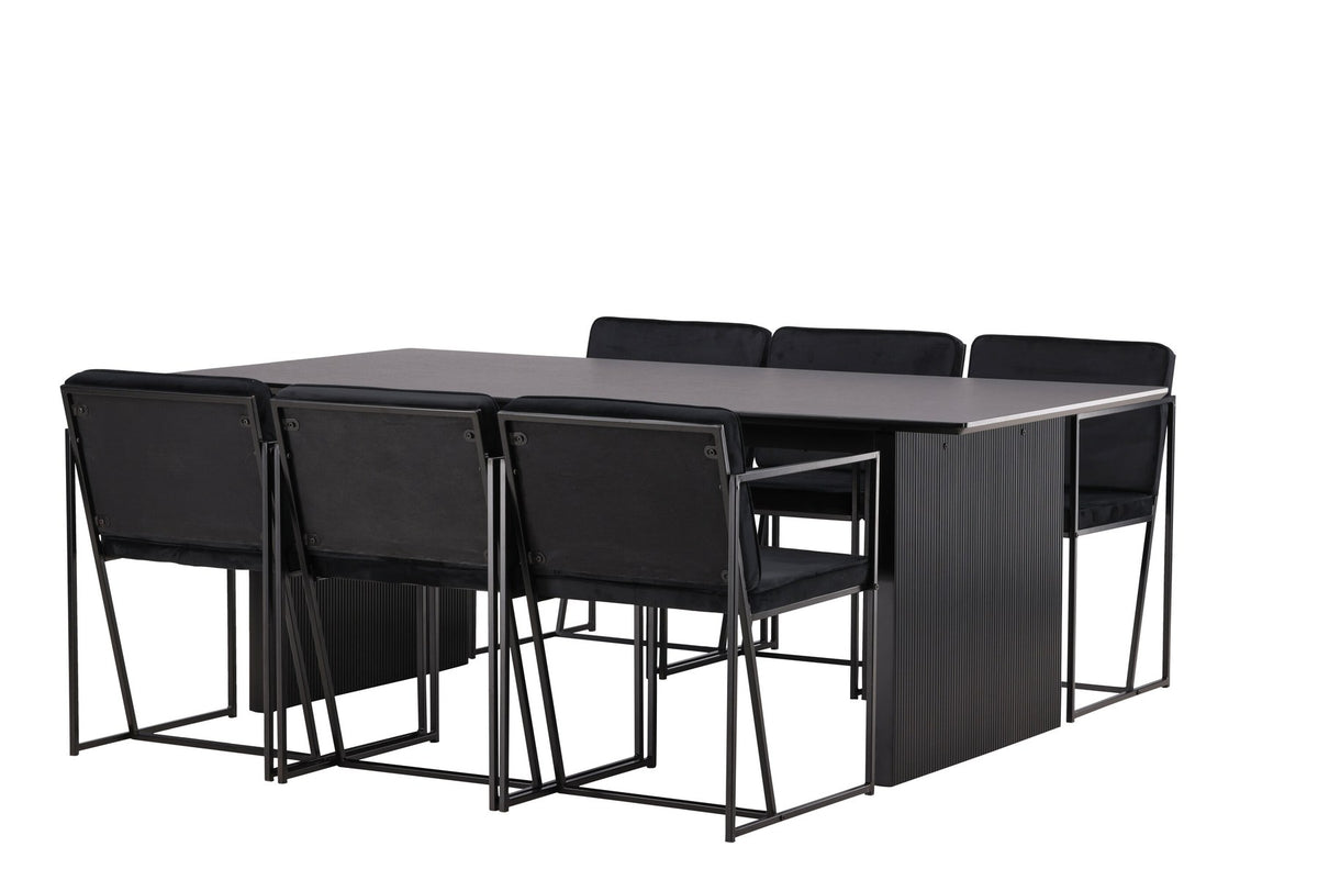 Esszimmerset aus rechteckigem MDF-Tisch in Rauchschwarz mit sechs Limhamn-Stühlen, beiger Samtbezug, muschelförmige Rückenlehne, schwarze Metallbeine.