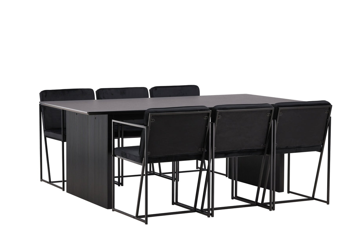 Esszimmerset aus rechteckigem MDF-Tisch in Rauchschwarz mit sechs Limhamn-Stühlen, beiger Samtbezug, muschelförmige Rückenlehne, schwarze Metallbeine.
