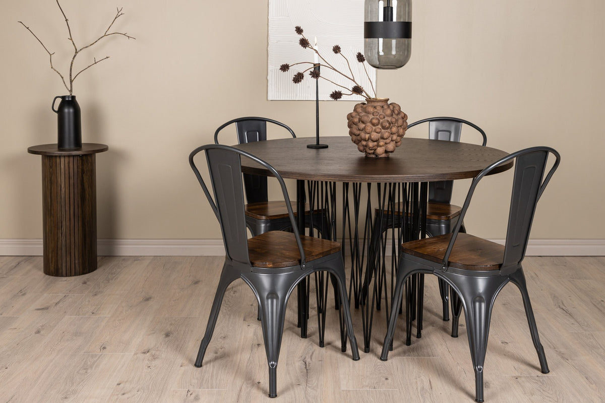 Rundes Esszimmerset mit Steinlook-Tisch aus MDF und Mocca-Furnier, schwarzem Metallgestell und vier Limhamn-Stühlen mit beigem Samtbezug.