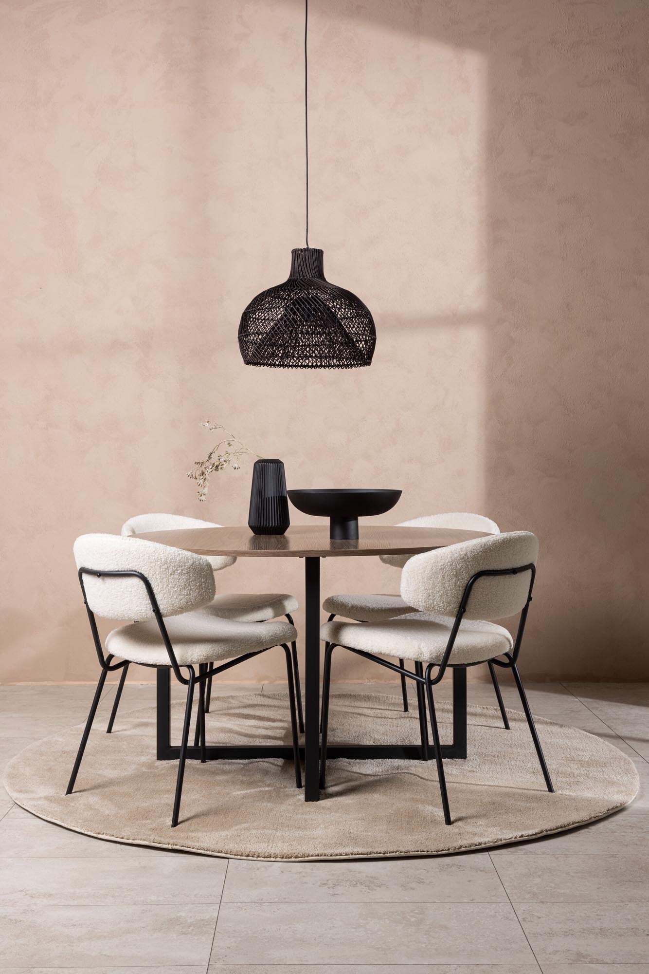 Stilvolles Durango Esszimmerset mit runden Tisch und luxuriösen Chico-Stühlen. Perfekt für gesellige Abende und moderne Einrichtung.