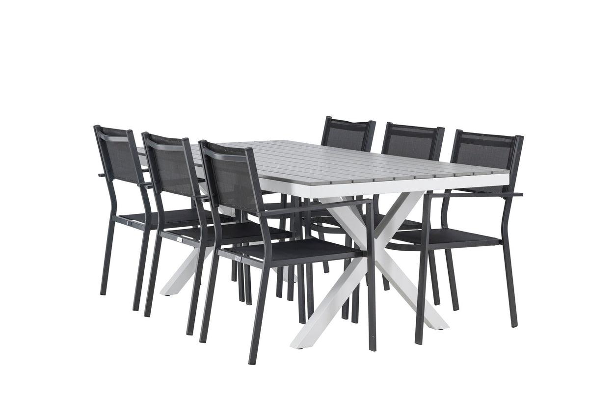 Rechteckiger Gartentisch Garcia mit Aluminiumgestell und Aintwood-Platte, umgeben von sechs stapelbaren Copacabana-Stühlen mit Textilene-Sitzfläche.