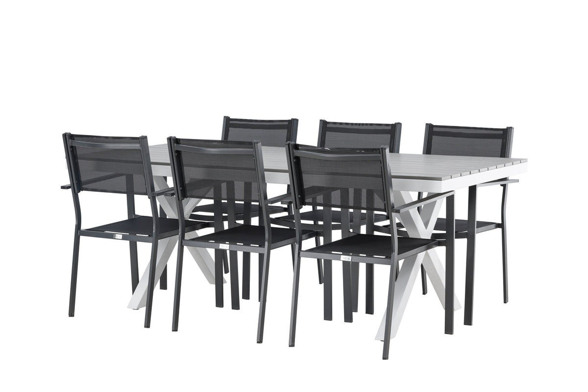 Rechteckiger Gartentisch Garcia mit Aluminiumgestell und Aintwood-Platte, umgeben von sechs stapelbaren Copacabana-Stühlen mit Textilene-Sitzfläche.