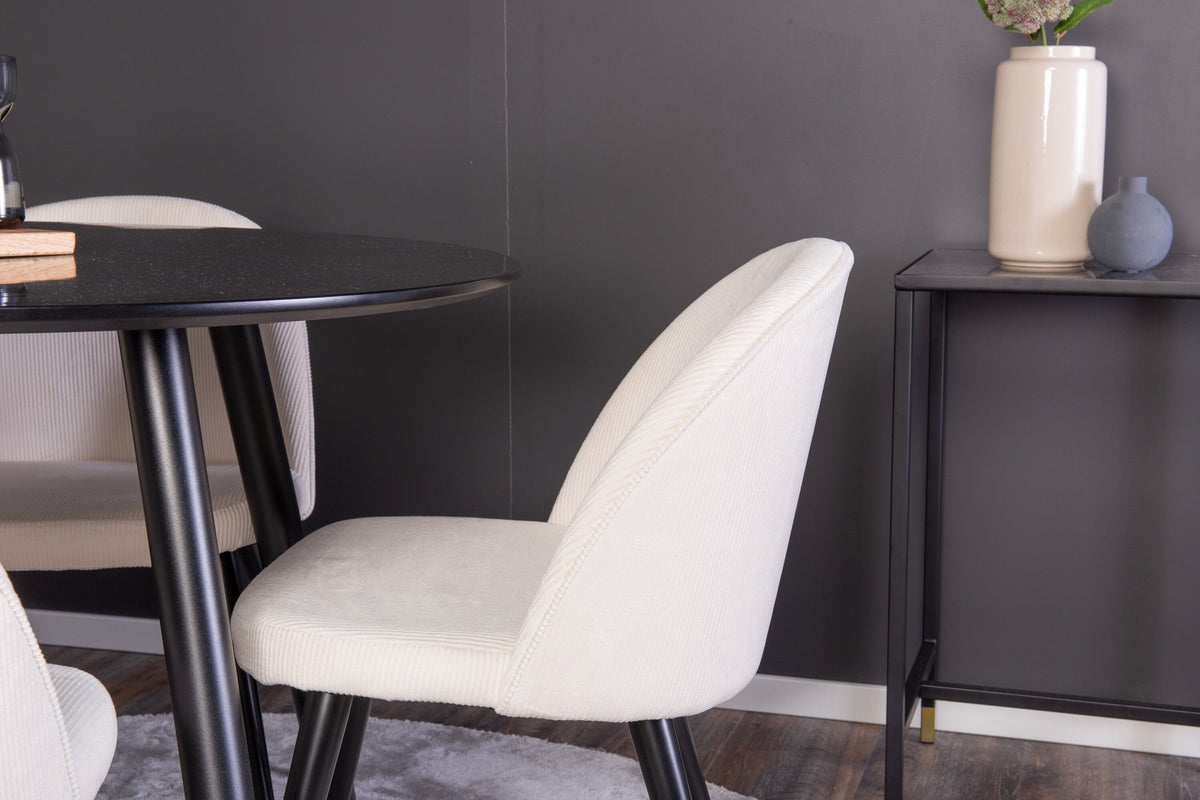 Esszimmer Set Plaza mit Stuhl Velvet von Venture Home: Esstisch aus MDF mit Stahlgestell in Schwarz, dazu vier gepolsterte Stühle.