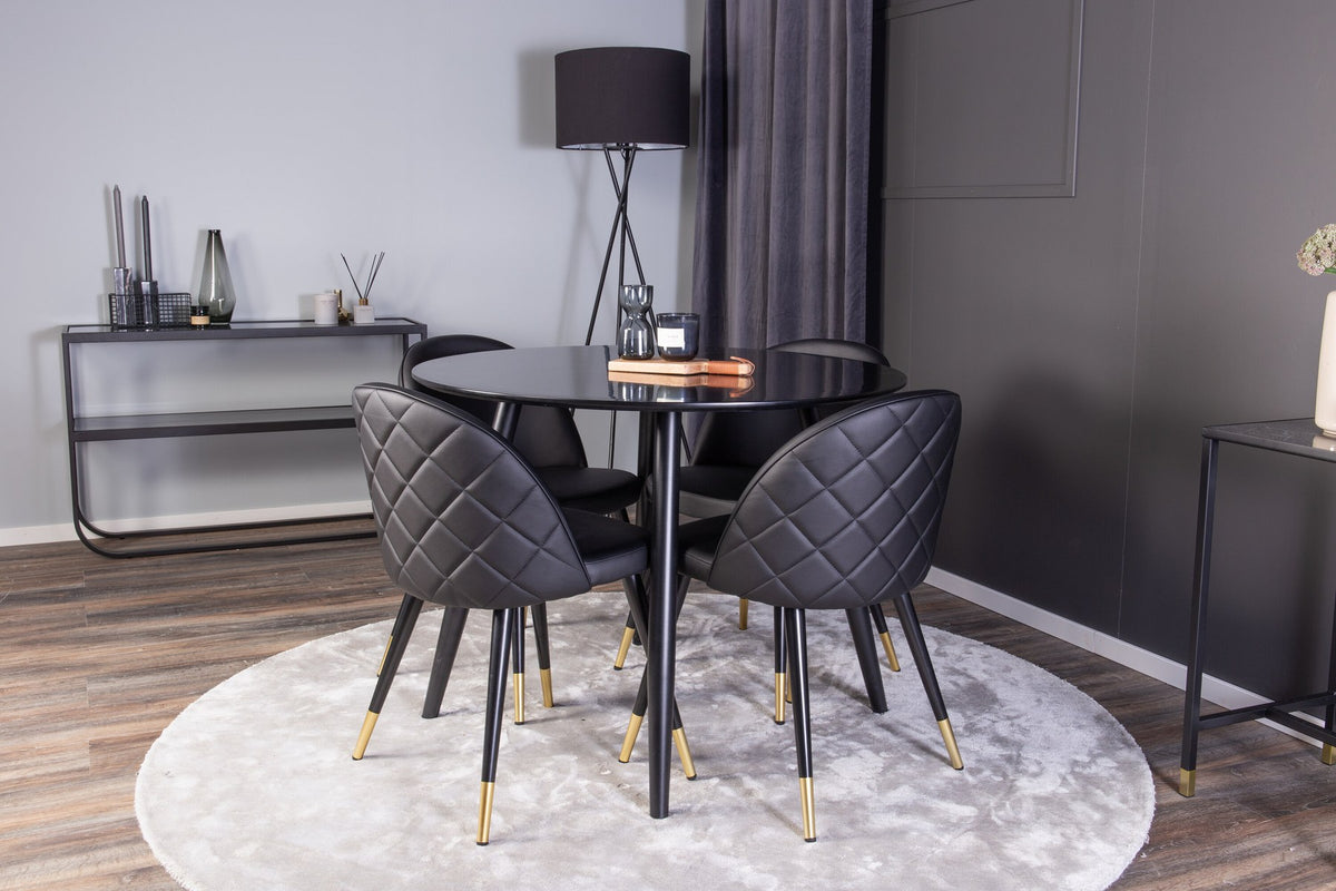 Esszimmer Set Plaza mit Stuhl Velvet von Venture Home: Esstisch aus MDF mit Stahlgestell in Schwarz, dazu vier gepolsterte Stühle.