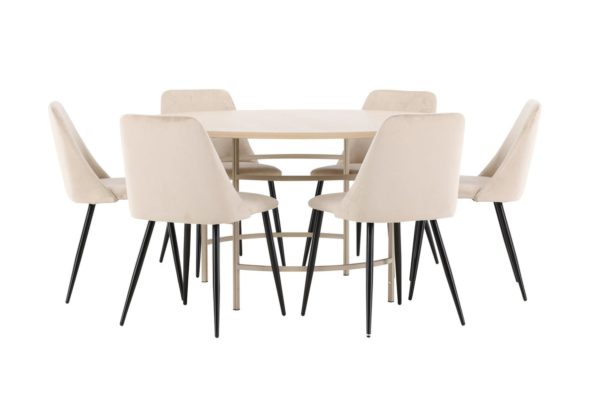 Rundes Esszimmerset Copenhagen mit Nachtstuhl von Venture Home: Tisch aus MDF in White Wash mit Metallgestell und sechs Samt-Stühlen mit schwarzen Beinen.