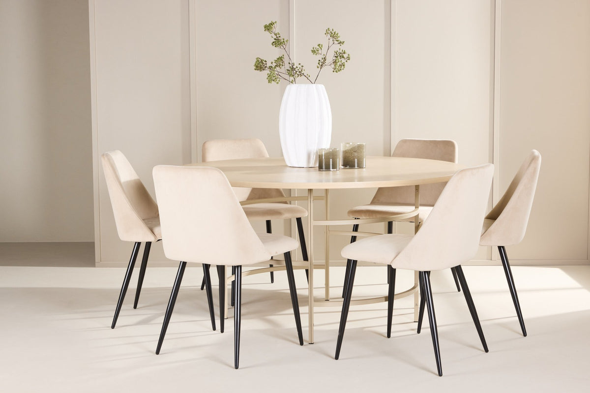 Rundes Esszimmerset Copenhagen mit Nachtstuhl von Venture Home: Tisch aus MDF in White Wash mit Metallgestell und sechs Samt-Stühlen mit schwarzen Beinen.