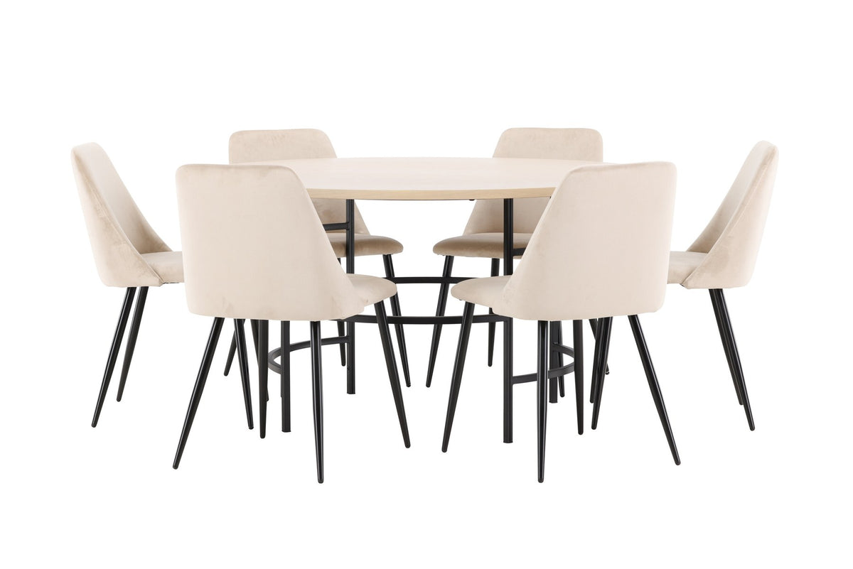 Rundes Esszimmerset Copenhagen mit Nachtstuhl von Venture Home: Tisch aus MDF in White Wash mit Metallgestell und sechs Samt-Stühlen mit schwarzen Beinen.