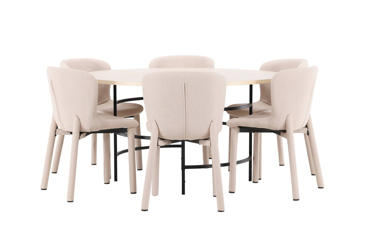 Runder Esstisch Copenhagen aus MDF in White Wash mit sechs Astoria-Stühlen aus Metall mit beiger Bouclé-Polsterung im Esszimmer.