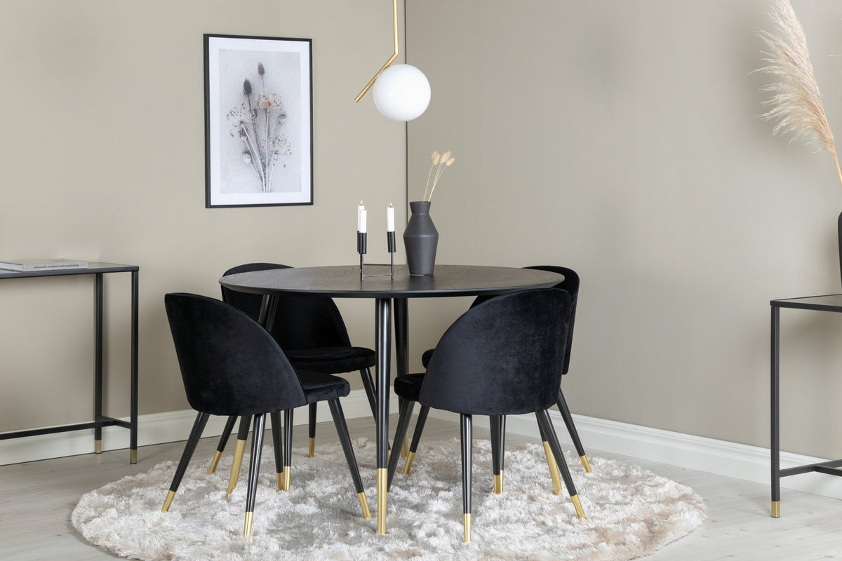 Rundes Dipp Esszimmerset: Esstisch ⌀115 cm mit schwarzem Furnier und schwarzen Beinen, dazu vier Velvet-Stühle mit schwarz-grauem Mikrofaserbezug.