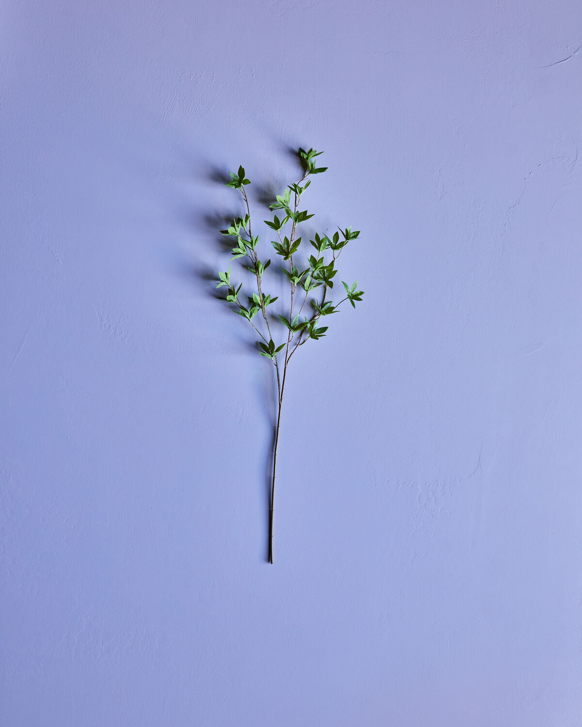 Kunstvolle HDJaponica Kunstpflanze in lebendigem Grün, ideal für stilvolle Dekoration und natürliche Akzente in jedem Raum.