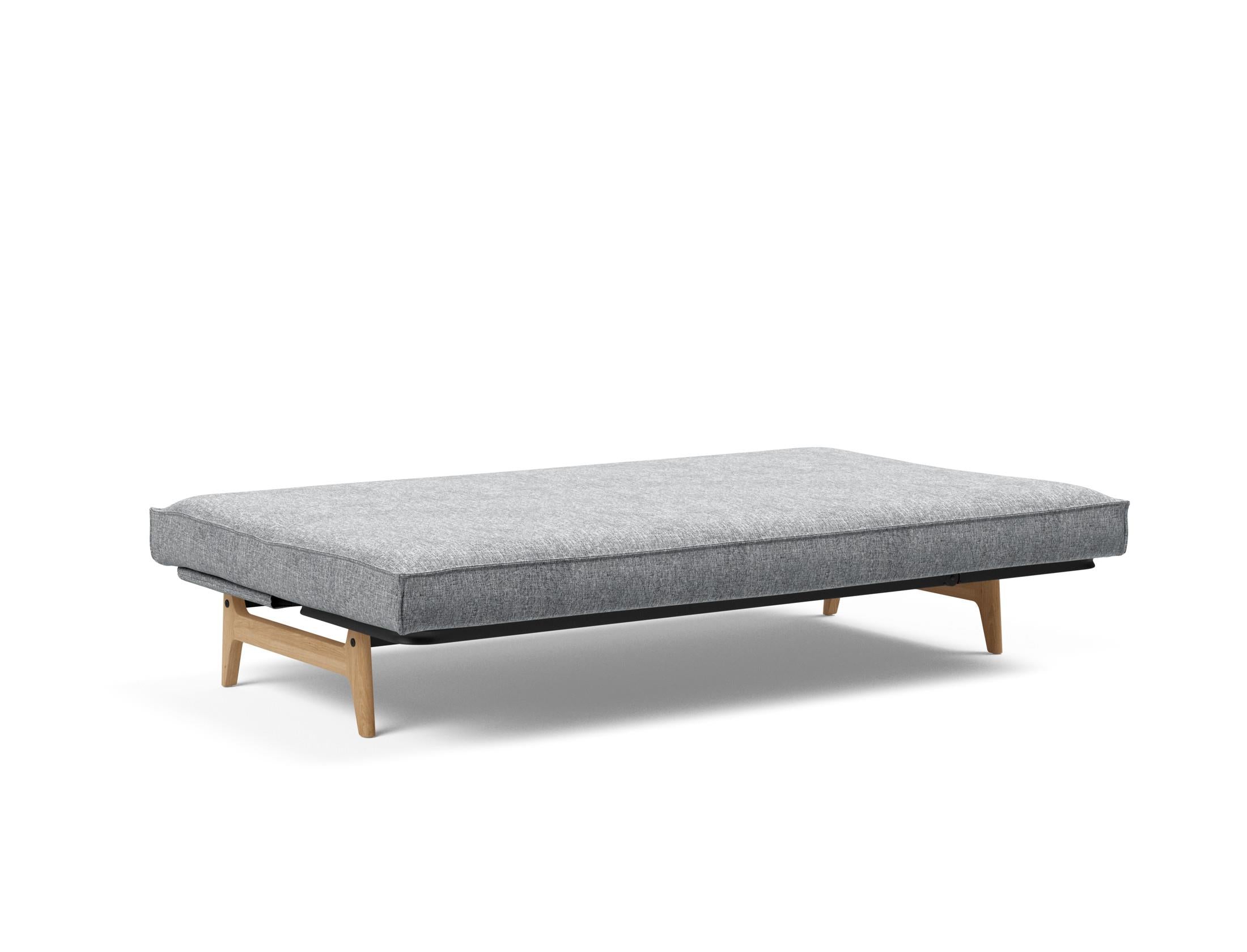 Entdecken Sie das Aslak 120 Bettsofa mit elegantem Soft Spring Bezug. Ideal für stilvolle Wohnräume und vielseitige Nutzung als Schlafsofa.
