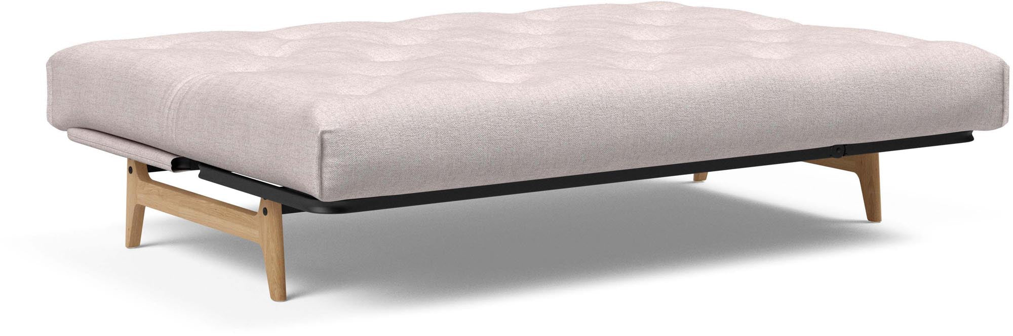 Entdecken Sie das Aslak 140 Bettsofa von Innovation Living – stilvolles Nordic Design und hochwertiger Latex für erholsame Nächte.