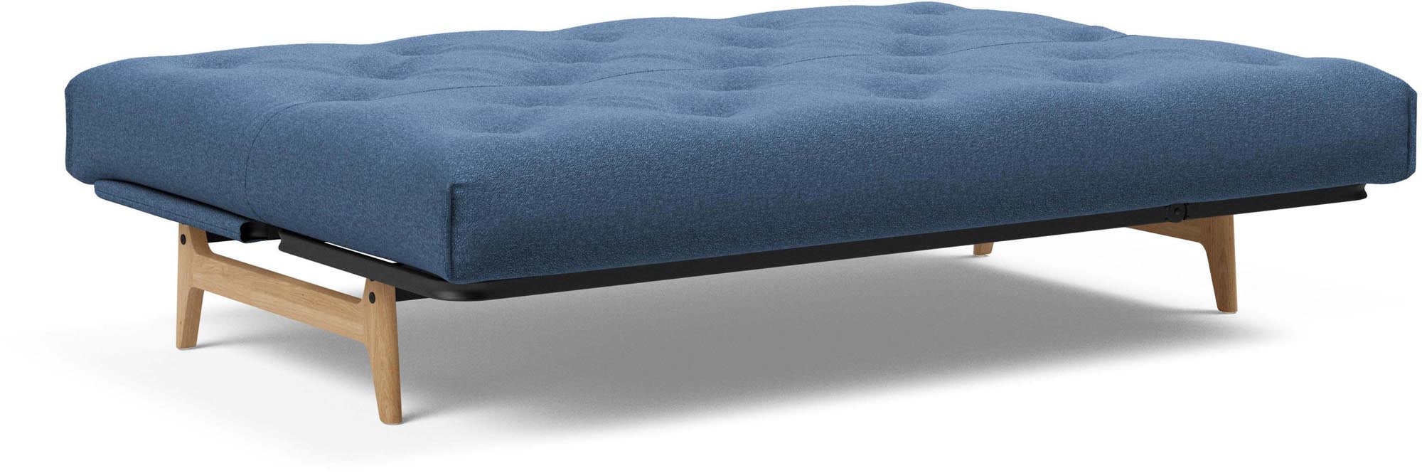 Entdecken Sie das Aslak 140 Bettsofa von Innovation Living – stilvolles Nordic Design und hochwertiger Latex für erholsame Nächte.