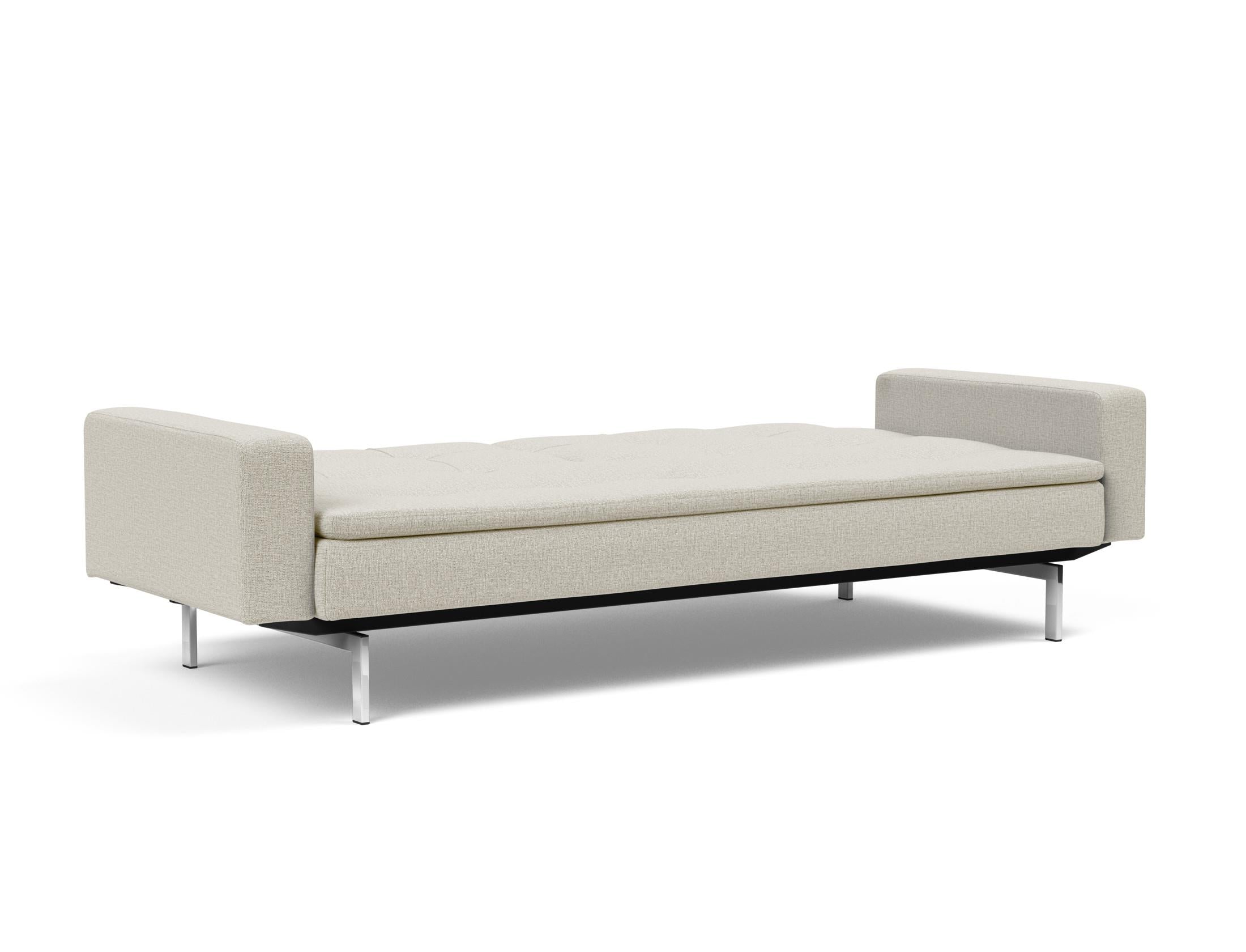 Das Dublexo Chrom Schlafsofa 115 mit Armlehnen bietet stilvolle Vielseitigkeit und Komfort, perfekt für moderne Wohnräume und Übernachtungsgäste.