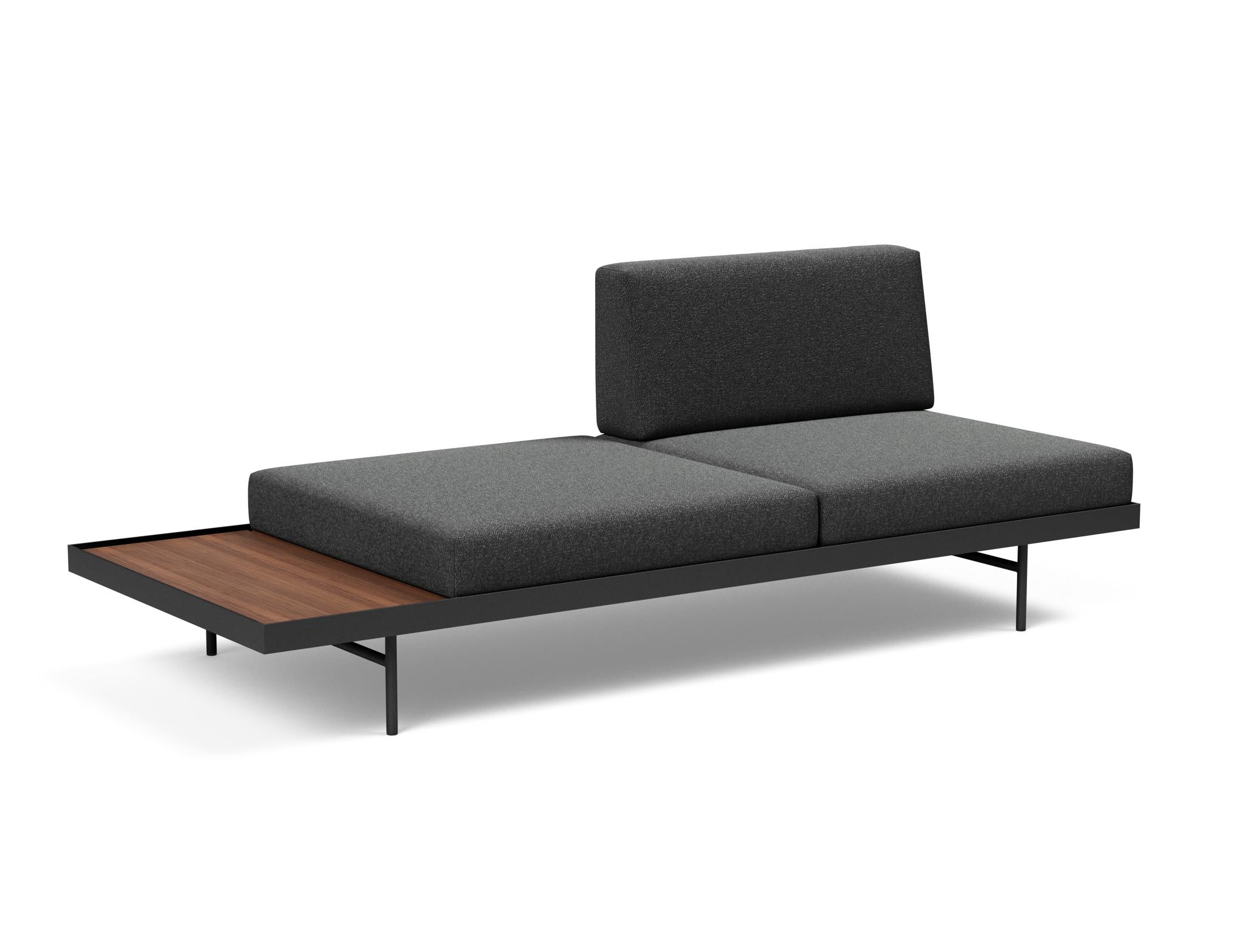 Entdecken Sie das Puri Klappsofa von Innovation Living – ein elegantes Möbelstück mit praktischem Tisch, ideal für moderne Wohnräume.