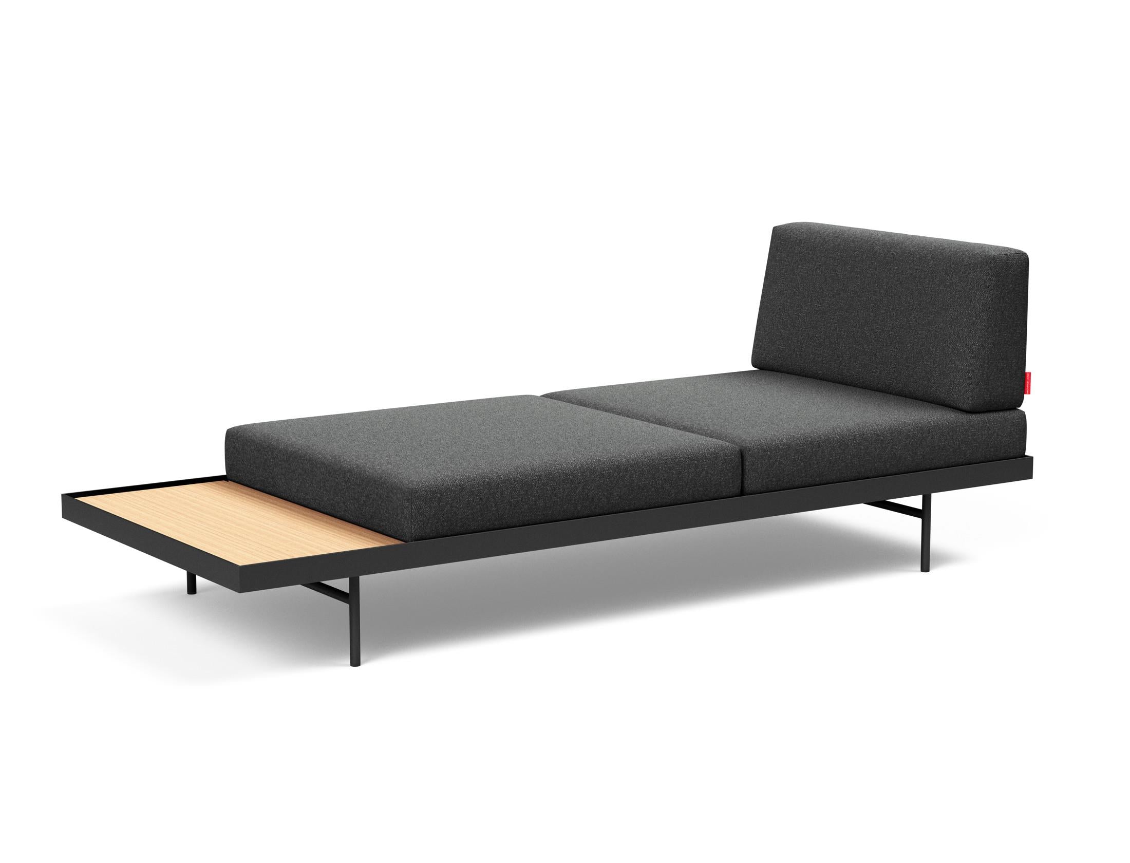 Das Puri Klappsofa von Innovation Living kombiniert stilvolles Design mit cleverer Funktionalität und bietet eine bequeme Schlaflösung samt praktischem Tisch.