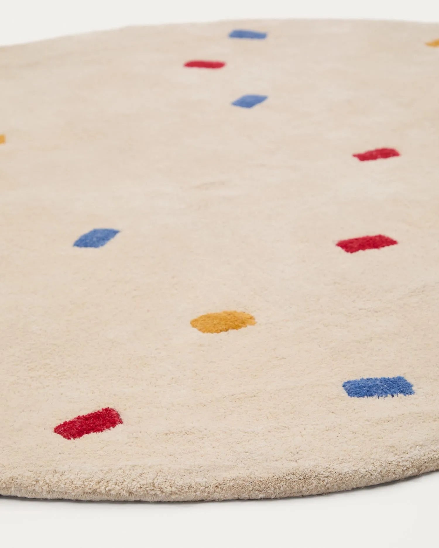 Luli: Bunter Baumwollteppich Ø120 cm, ideal für Kinderzimmer. Weich, pflegeleicht, fröhlich und langlebig.