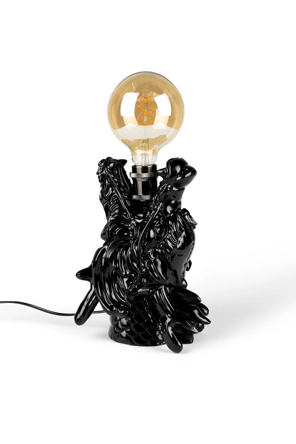 Die Dragonized Bastard Tischlampe von Bold Monkey: Einzigartiges Design, hochwertige Materialien, kompakt und stilvoll für jeden Raum.