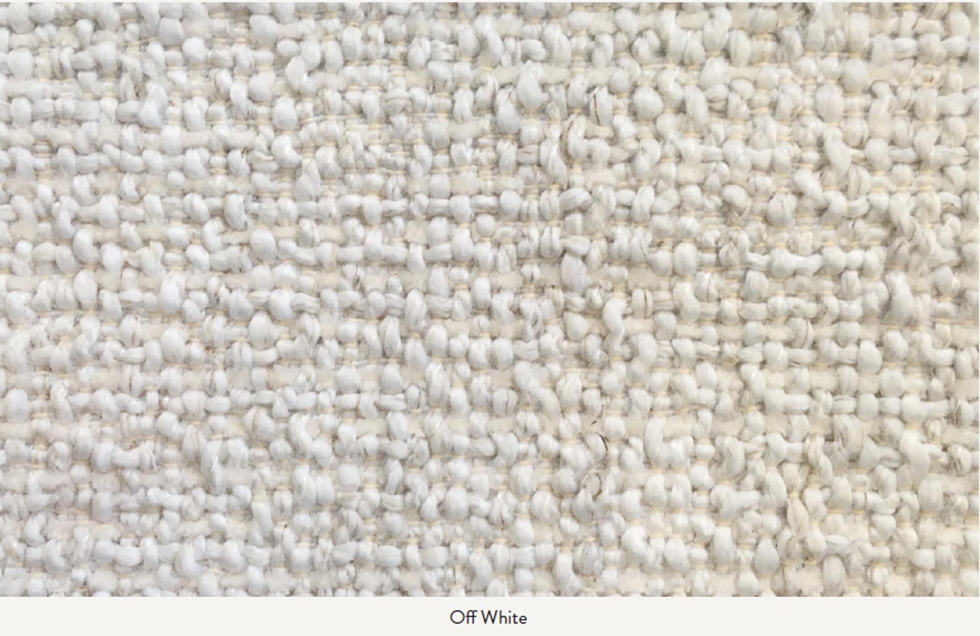 Eleganter Bouclé-Hocker Rico von Ferm Living für stilvolle Räume.