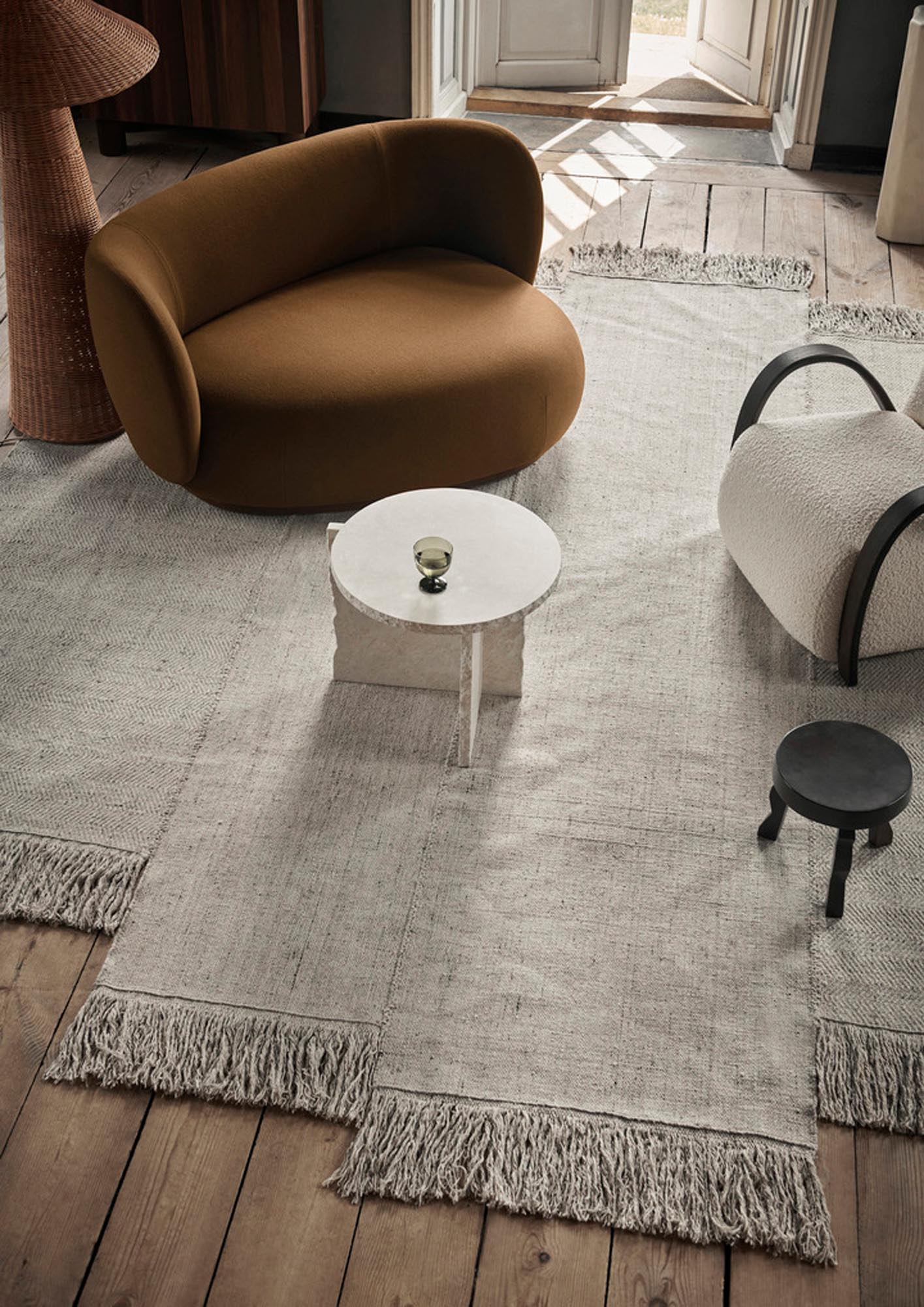 Ferm Living Alter Teppich: Authentische Eleganz für Ihr Interieur.