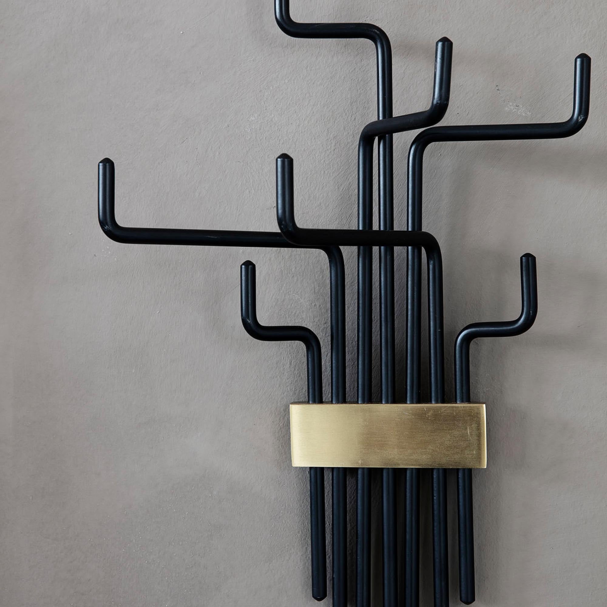 Moderner Haken Pipes von House Doctor für urbanes Wohnambiente.