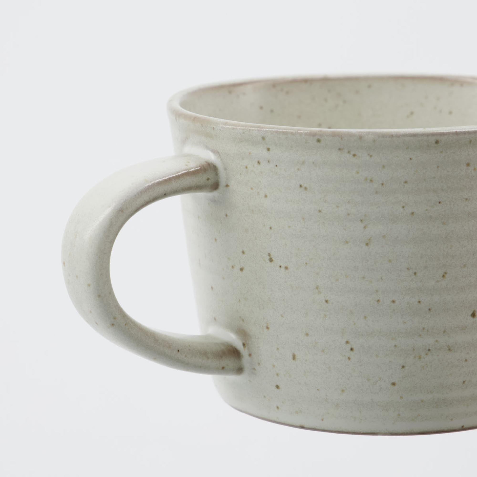 Stilvolle HDPion Tasse mit Untertasse, grau/weiß, von House Doctor.