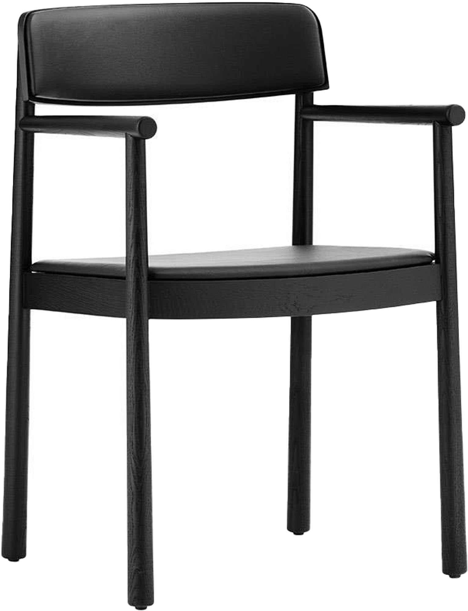 Der Timb Stuhl mit Armlehne von Normann Copenhagen besticht durch minimalistisches Design, handwerkliche Details und bequeme Polsterung.