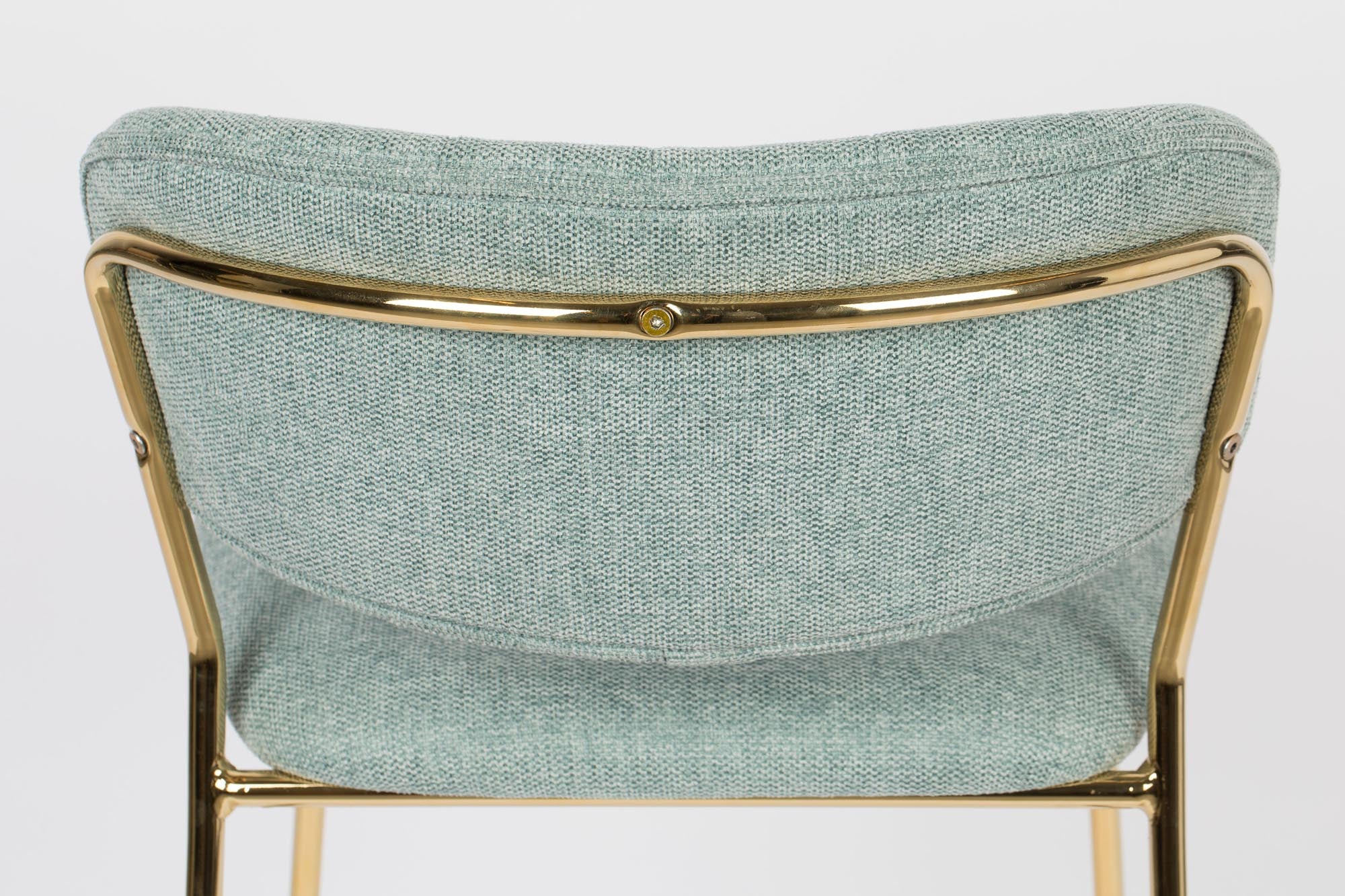 Der stilvolle Barstuhl Jolien von White Label Living vereint Komfort und Eleganz, perfekt für moderne Wohnräume und gesellige Runden.