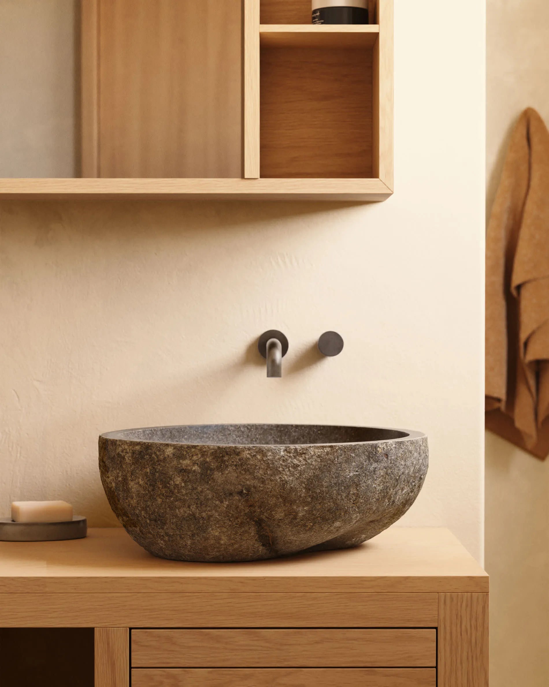 Das Tetsu Aufsatzwaschbecken aus Naturstein, Ø 40 cm, vereint zeitlose Eleganz und Funktionalität für Ihr modernes Badezimmer.