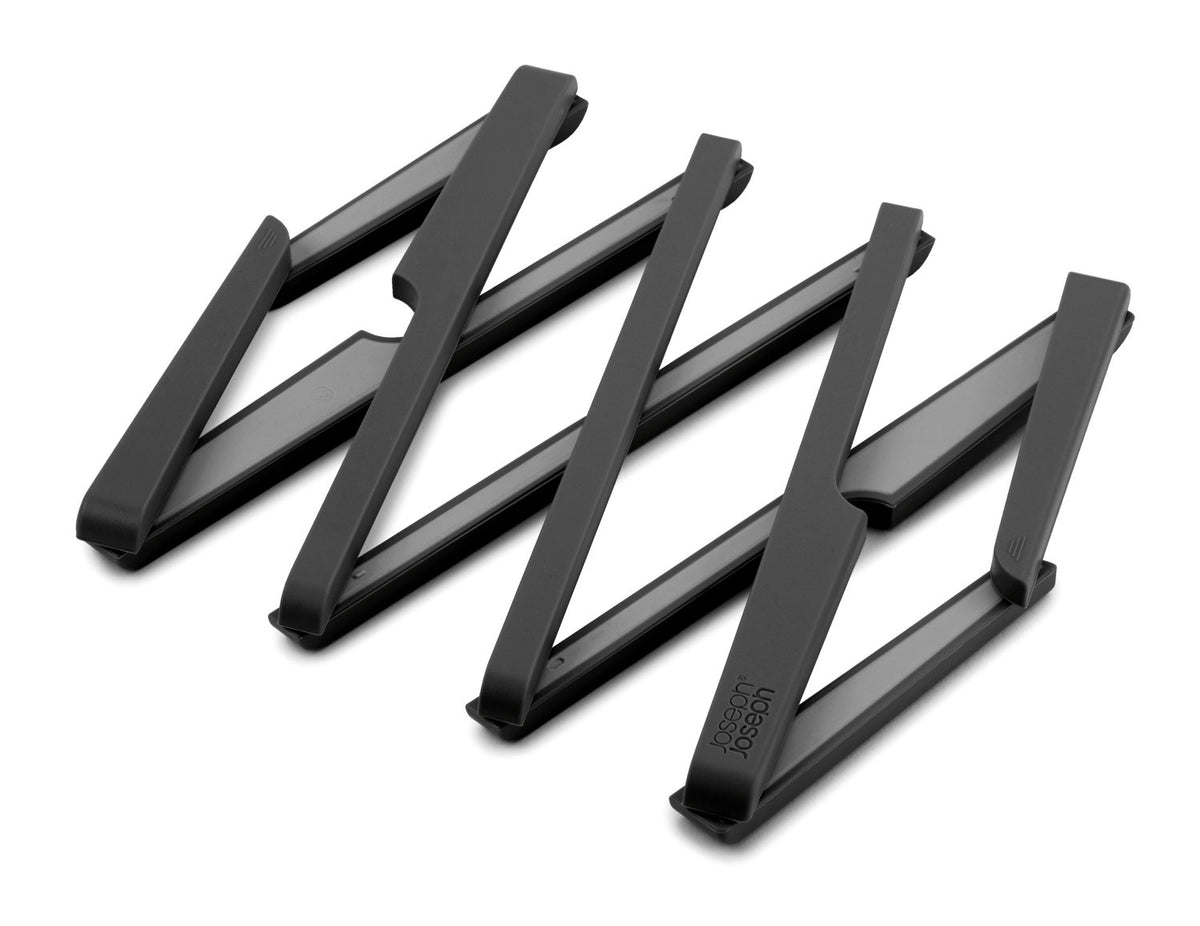 Stretch Topfuntersetzer schwarz 19.5x5cm in Schwarz präsentiert im Onlineshop von KAQTU Design AG. Tischset ist von Joseph Joseph