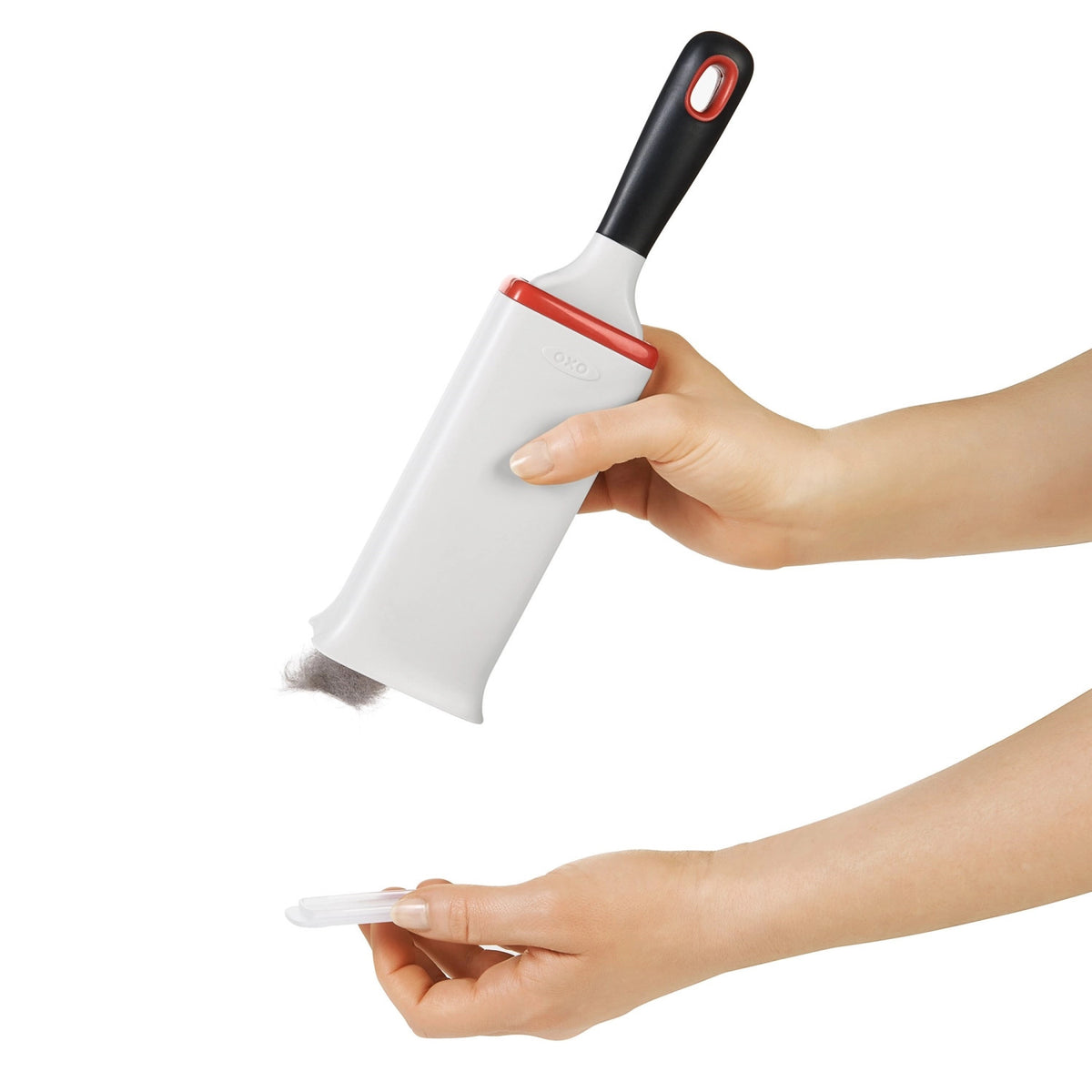 Flusenentferner-bürste für Kleider, weissorange in Orange präsentiert im Onlineshop von KAQTU Design AG. Besen ist von OXO