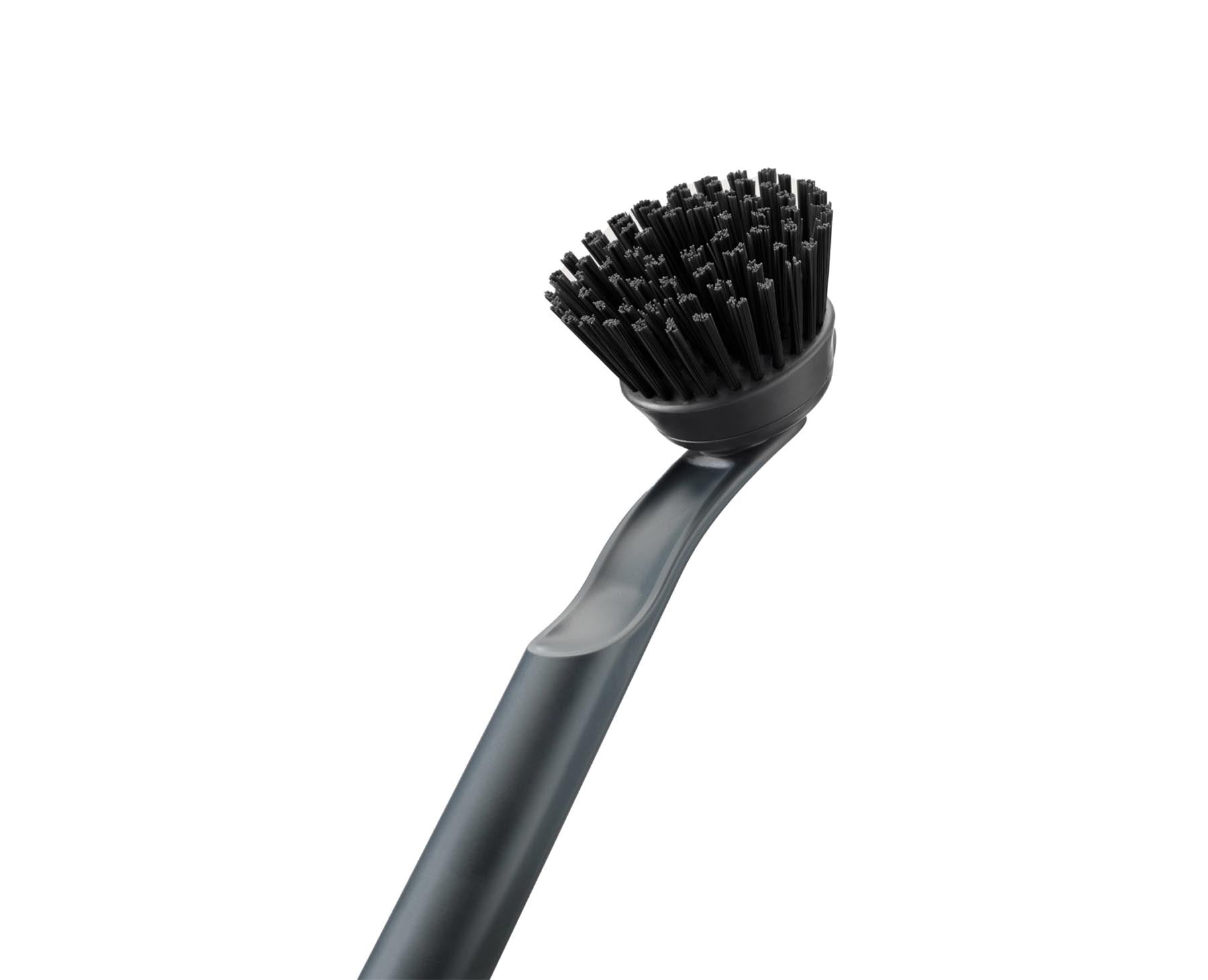Moderne Spülbürste in Graphit mit ergonomischem Design und austauschbarem Kopf, perfekt für müheloses Geschirrspülen.