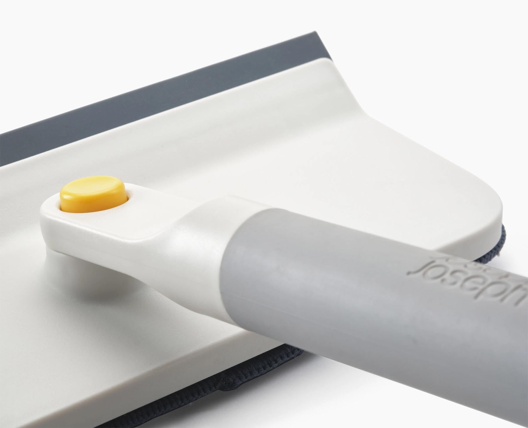 Vielseitiger CleanTech 2-in-1 Abzieher in modernem Lichtstein-Grau, perfekt für mühelose Reinigung und Wäschepflege von Joseph Joseph.